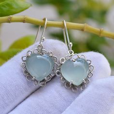 Aqua Chalcedony Earrings, Sterling Silver Earrings, Aqua Chalcedony 14x14mm Hearts Shape Earrings, Handmade Earrings, Chalcedony Earrings--------------------------------------------------------------------------------------------------------------------------------Metal: Solid 925 Sterling SilverStyle:  Drop Dangle EarringsStone Detail :Natural Aqua ChalcedonySize-14x14mm Hearts Cabochons------------------------------- ----------------------------------------------------------------------------- Round Valentine's Day Earrings With Ear Wire, Valentine's Day Round Earrings With Ear Wire, Handmade Heart-shaped Earrings, Handmade Silver Heart Cut Earrings, Fire Earrings, Green Amethyst Earrings, Aqua Earrings, Chalcedony Earrings, Blue Topaz Earrings