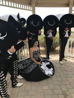 a group of people dressed up in costumes