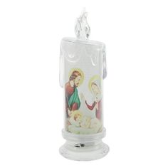 a glass candle with an image of jesus and mary