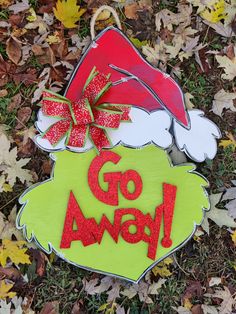 When your an introvert but your ready to be festive,  this doorhanger is sure to add that perfect pop of color and whimsy to your door! It is laser cut out of 1/4 wood then painted and topped with a beautiful bow! It is offered in a variety of sizes to fit any space! They are offered in 3 different sizes. 12 Inch which is on the smaller side 18 Inch which is a perfect regular doorhanger size 24 Inch  If you like a large oversized doorhanger, this ones for you! I also offer them as a DIY kit which is just the laser cut wood pieces! You can customize them to your liking at a great price!  (paint and bows are not included in the Do It Yourself kit, hanging kit and wooden sign pieces only) We pride ourselves in excellent turn around time. Each sign is made in the order it is received. Please a Elf Wood Sign, Whoville Sign Diy, Christmas Wood Cutouts Yard Art Diy, Diy Grinch Outdoor Decorations, Diy Whoville Decorations, Grinch Signs Wooden Diy, Whoville Christmas Decorations Diy, Diy Grinch Decorations, Grinch Christmas Decor