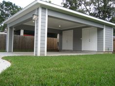 a garage in the middle of a yard