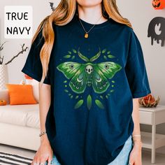 🦋 Moth Lover Gift: This shirt is a canvas of mysterious luna moth, moon and skull, capturing the essence of spooky dark cottagecore vibes. 🌿 Gardeners' Delight: This tee is a wearable ode to the green-thumbed enthusiasts. Let the design inspire you in the joys of nurturing and growth. 🌙Perfect for a luna moth lover gift, moon lover gift, nature lover gift, witchy gift, mom gift, best friend gift, cousin gift, gift for her, gift for girlfriend, mom etc. ☀️ SIZING NOTE: This is an adult unisex Moth Shirt, Halloween Green, Mom Best Friend, Moon Lover, Cottagecore Vibes, Cousin Gifts, 10 December, Gifts For Girlfriend, Dark Cottagecore