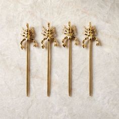 Cast brass scorpion cocktail picks add a playful garnish to cocktails and canapes. A CB2 team favorite, this set of four makes a great gift. CB2 exclusive.  -Cast brass pick heads, stainless steel picks with a food-safe brass-colored PVD finish -Set of four -Ships in CB2 gift packaging -Made in India Scorpio Brass Cocktail Picks Set of 4 Cocktails And Canapes, Unique Hostess Gifts, Most Popular Cocktails, Glass Tealight Candle Holders, Home Bar Accessories, Cocktail Picks, Cocktail Accessories, Black Vase, Old Fashioned Glass