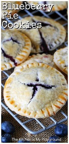 blueberry pie cookies on a cooling rack with the words blueberry pie cookies above them