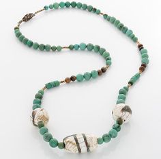 This delightful necklace has a tribal feel and the natural green turquoise is striking. It is 23 inches long with brass beads and a brass safety clasp that set it off. One of a kind. Properties are: Bone: strength in any creative endeavor Turquoise: brings wisdom, power, luck and protectionTigers Eye: calms, opens mid-range chakras, reveals hidden issuesBrass: attracts health & wealth Set It Off, Bone Strength, Bone Necklace, Tiger Eye Beads, Mala Bracelet, Eye Beads, Bone Beads, Stretchy Bracelets, Small Patio