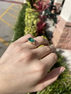 Setting Style: Solitaire / Bezel Setting Material: 14K Yellow Gold Gold Weight: 5.7 grams Main Stone: Emerald Shape: Pear Cut Weight: 2.18-carats Clarity: Semi-Transparent Color: Green Luster: Excellent - Very Good Origin: Brazil Estimated retail value: $7,120.00 USD! If you have a special request for a custom-created item please contact us at 1 800 840 6828. Complimentary shipping with the USA & Certification of an appraisal! Teardrop Bezel Setting Promise Ring, Teardrop Bezel Setting Jewelry For Promise Ring, Teardrop Emerald Ring Fine Jewelry, Green Solitaire Teardrop Jewelry, Solitaire Pear-shaped Emerald Ring For Gift, Pear-shaped Solitaire Emerald Ring As Gift, Pear-shaped Solitaire Emerald Ring For Gift, Anniversary Jewelry With Bezel Setting In Drop Shape, Fine Jewelry Emerald Teardrop Ring For May Birthstone