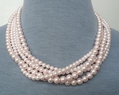 PREFERENTIAL POLICIES : The order is $50 or more.There will be a 10% discount.long-term effective. Please use the coupon code: CZH10 Welcome back to my shop: https://www.etsy.com/shop/pearlandjewelry Description of the product in the picture: The necklace is 18 inches long ,5 Strands glass Pearl Necklace, and I make them with 6mm and 8mm light pink glass pearls, This necklace included three layer 6mm and two layer 8mm light pink pearl. IT has a 2 inches long adjustable chain ,It is nice for your Pink Pearl Chain Necklace For Wedding, Pink Pearl Necklaces For Wedding, Pink Round Bead Pearl Necklace For Wedding, Pink Round Beads Pearl Necklace For Wedding, Pink Pearl Necklace With Round Beads For Wedding, Pink Pearl Necklace For Wedding, Pink Pearl Bridal Necklace Gift, Pink Pearl Bridal Necklace As A Gift, Pink Round Bead Necklaces For Wedding