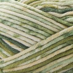 closeup of yarn with green and white stripes