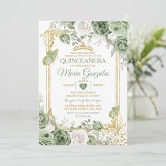 a wedding card with roses and leaves on the front, in gold foil lettering that reads quinceanera