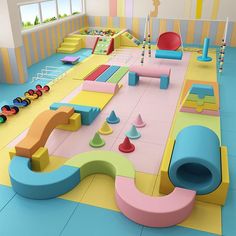 an indoor play area with colorful furniture and toys