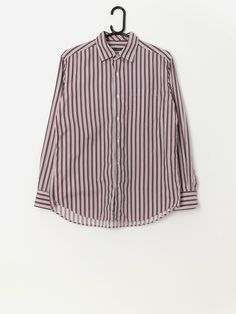 Vintage corduroy striped shirt in white, red and purple. This corduroy white shirt features red, purple and black stripes, a full button closure, buttoned cuffs and is made from a soft, mid-weight cotton. Our recommended size: Medium Label says: Large Condition: Very good  Material: No care label, confident it it cotton  Measurements in inches: Pit to pit: 20.5 Shoulders: 17.5 Front length: 27.5 Back length: 29 Sleeve length: 23 We recommend that you compare our measurements to a similar item of Vintage Corduroy, Red And Purple, Care Label, Red Purple, Striped Shirt, Black Stripes, White Shirt, Favorite Outfit, Violet