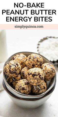 no - bake peanut butter energy bites in a bowl next to a glass of milk