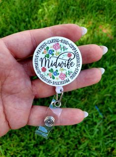 This midwife badge reel is made of hardboard and ink is pressed directly into it making it long lasting. It measures approx. 1.5 inches.  It is attached to a retractable plastic Badge reel Doula Tips, Pioneer School Gifts, Doula Business, Rainbow Badge, Hospice Nurse, Jw Pioneer Gifts, Jw Pioneer