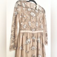 Sequined, Semi Lined With Sheer Overlay. Attached Ribbon “Belt”. Zipper Back. Tags Attached As Well As Extra Sequins. Comes To Knee. Depending On Height. I’m 5’2” And It Comes Slightly Below Knee. No Noticeable Snags. Never Worn. Beautiful For Wedding Or Semi Formal. Cream Spring Dress With Sequins, Long Sleeve Embellished Beige Dresses, Cream Embellished Long Sleeve Dress, Beige Long Sleeve Embellished Dress, Bhldn Dresses, Sequined Dress, Ribbon Belt, Sheer Overlay, Sequin Dress