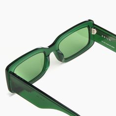 EMERALD ACETATE / GREEN LENS / SILVER HARDWARE DESCRIPTION The original Verve featured a bevel-edged rectangular frame and sunken lenses to create one of our most popular styles ever. New Verve adds an updated shape and new colorways while keeping the best parts of the fan-favorite OG. Each pair is handmade in limited numbers to maintain precision and quality that will look great and last for years. We plant a tree for each pair of glasses sold on our website in partnership with Eden Reforestati Elegant Green Rectangular Sunglasses, Classic Green Rectangular Sunglasses, Green Rectangular Sunglasses With Mirrored Lenses, Luxury Green Glass Sunglasses, Green Rectangular Tinted Sunglasses, Modern Green Anti-reflective Sunglasses, Green Square Frame Sunglasses With Gradient Lenses, Green Lens, Crystal Green