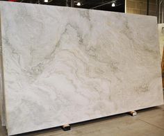 a large white marble slab in a warehouse