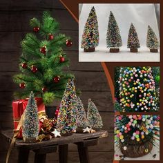 christmas trees made out of candy are displayed in front of a wooden table with presents on it