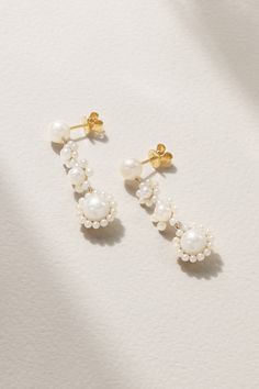 Unlike real flowers, the beauty of Sophie Bille Brahe's blossom-inspired jewelry will live forever. Made from 14-karat recycled gold, these 'Fleur Jeanne' earrings are strung with clustered arrangements of freshwater pearls that sway with every move you make. Wedding Flower Earrings In 14k Yellow Gold, Elegant 14k Yellow Gold Flower Earrings, Elegant Yellow Gold Cluster Dangle Earrings, Elegant Yellow Gold Dangle Cluster Earrings, Elegant Round Cluster Earrings In 14k Gold, Elegant Yellow Gold Cluster Earrings For Anniversary, 14k Gold Flower Earrings Jewelry, 14k Gold Flower-shaped Earrings, 14k Gold Flower-shaped Matching Earrings