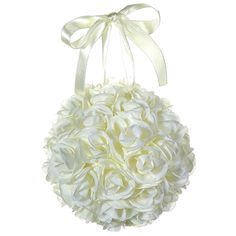 a white flower ball hanging from a ribbon