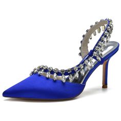 a pair of blue high heeled shoes with crystal embellishments