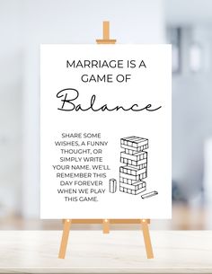 a sign that says marriage is a game of balance, and the words are written on it