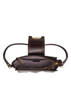 Convertible straps allow you to customize your everyday looks with this durable crossbody bag that's slender and shaped from supple leather. Interior zip and slip pockets Lined Leather Imported