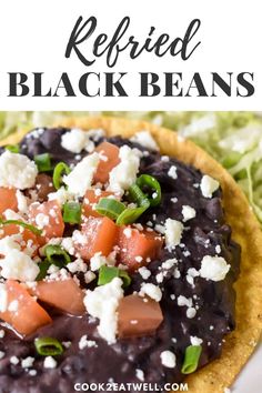 a tortilla topped with black beans and cheese