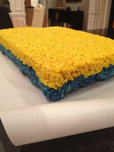 a cake that looks like it is made out of rice krispy kreme