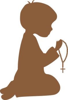 the silhouette of a child kneeling and holding a rosary