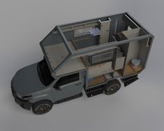 an image of a truck that is in the shape of a house with its doors open