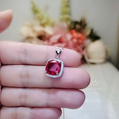 "Ruby pendant full sterling silver made Ruby Necklace ◆◆Pendant Main stone:10mm created red ruby Pendant Height ( include bail) : 18.8mm Pendant Holder (bezel & Bail) : White Gold Coated fine 925 Sterling Silver Accent Stone: Sim Diamond ◆◆ Necklace chain : Platinum gold coated 925 sterling silver Box Chain with length option from 16\" ~20\". The model wearing the default size 18\". 16 inch ≈ 40cm 18 inch ≈ 45cm 20 inch ≈ 50cm ♥ Gemstone Reference Meaning Card included. ♥ Jewelry Box Packagi Elegant Red Diamond Gemstones, Red Fine Jewelry As A Gift For Her, Red Pendant Jewelry As Gift For Her, Red Pendant Jewelry As A Gift For Her, Red Jewelry With Accent Stones For Gift, Ruby Gemstones With Accent Stones As Gift, Red Ruby Jewelry Gift For Her, Exquisite Ruby Jewelry For Gift, Red Cubic Zirconia Jewelry With Accent Stones