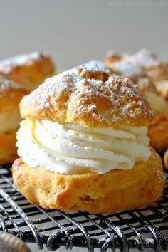 several pastries sitting on top of a cooling rack