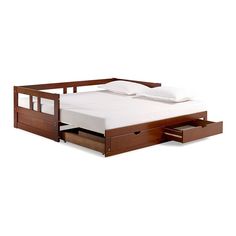 a bed with two drawers underneath it and a white sheet on the bottom half of the bed