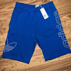 Nwt Blue Adidas Men’s Shorts Aeroready Moisture-Absorbing Technology And Iconic Adidas Detailing Of These Essentials Shorts From Adidas. Comes With Side Pockets And A Back Pocket. Made With 100% Cotton Blue Cotton Pants With Built-in Shorts, Adidas Streetwear Bottoms With Built-in Shorts, Adidas Bottoms With Built-in Shorts For Streetwear, Adidas Cotton Bottoms With Built-in Shorts, Adidas Blue Streetwear Pants, Blue Adidas Streetwear Pants, Adidas Blue Cotton Shorts, Adidas Bottoms For Streetwear, Adidas Bottoms For Summer Streetwear