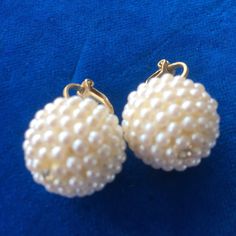 "1950s 1960s Vintage Pearl Beads Clip On Earrings Mid Century Hollywood Regency Rockabilly Great looking cluster beaded pearl earrings. Clip on, measure about 3/4\" diameter. One small clear rhinestone in the center to add that accent sparkle! Can be worn formal or just to match your simple set of pearls... Please see photos." Vintage White Pearl Clip-on Earrings, Party Pearl Earrings With Beaded Detail, Beaded Pearl Earrings For Party, Evening Beaded Earrings With Round Beads, Vintage Beaded Earrings For Party, Costume Jewelry Pearl Earrings For Party, Beaded Evening Earrings, Handmade Vintage Pearl Earrings, Retro Beaded Jewelry For Party