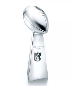 the football trophy is shown on a white background