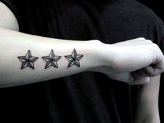 three stars tattoo on the arm