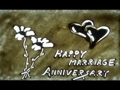 happy marriage anniversary card with two hearts and flowers