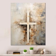 an abstract painting of a cross on a wall