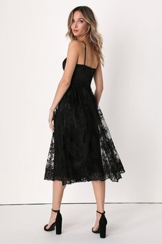 Achieve the picture-perfect romantic look with the Lulus My Darling Daydreamer Black Lace Bustier Midi Dress! A sheer mesh overlay is adorned with intricate floral embroidery (atop a satiny woven liner) as it forms adjustable straps, a sweetheart neckline, and a bustier bodice with padded, underwire cups. The set-in waist boasts strips of hidden boning before flowing into an A-line midi skirt with scalloped trim. Hidden back zipper/clasp. Fit: This garment runs small - please size up. Length: Kn Evening Dress With Sweetheart Neckline And Lace Closure, Lace Dresses With Sweetheart Neckline, Sweetheart Neckline Lace Dresses With Lace Closure, Delicate Lace Midi Dress For Party, Spring Dress With Sheer Bodice And Spaghetti Straps, Lace Dress With Lace Closure For Prom, Summer Cocktail Midi Dress With Lace Bodice, Lace Prom Dress With Lace Closure, Lace Corset Dress With Lace Trim For Date Night