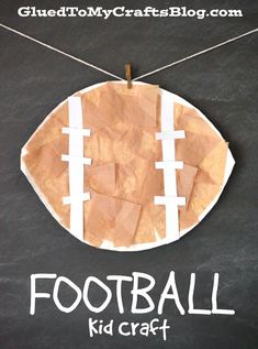 a piece of paper that has been cut in half to make a football ornament