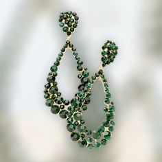 These stylish emerald crystal earrings are the perfect accessory for many formal events. Pageants, Prom, Bridal, Wedding Day, Holiday Gift, sweet 16, On stage earrings, Gifts for her . Earring Color: emerald, gold Earring Length: 3.75 inches Earring Length: 1.5 Inches Earring Type: Pierced/ Post Back Other Colors available in my shop. If you can't find what you are looking for please contact me I'd love to help. Need multiple pairs for bridal gifts or needing a different color? I would love to h Dark Green Crystal, Pink Statement Earrings, Pageant Earrings, Emerald Crystal, Prom Earrings, Chunky Earrings, Purple Earrings, Emerald Earrings, Green Crystal