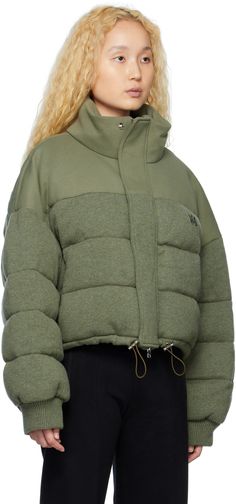 Quilted paneled knit cashmere and cotton jersey down-filled jacket. · Stand collar · Press-stud placket and concealed zip closure · Logo graphic embroidered at chest · Zip pockets · Bungee-style drawstring at hem · Rib knit cuffs · Zip pocket at interior · Full cotton lining Supplier color: Olive green Fill: 100% goose down. Quilted Puffer Jacket, Outer Wear, Waterproof Jacket, Knit Jacket, Padded Jacket, Green Jacket, Logo Graphic, Casual Jacket, Sport Fashion