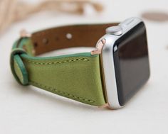 Full Grain Leather Green Slim Band for Apple Watch 1-6Material: Full grain leather. Our leathers are premium quality full grain leather and tested by international firms.Size: Medium (fits 150-190mm (5.9"-7.4") wrists.)Color of buckle will be same of adapter color.Customization: We can write names, dates, texts on straps. You may have this service from here: www.etsy.com/listing/643428565CUSTOMER SATISFACTION GUARANTEE: If you are not satisfied with our items within 30 days after you receive, pl Apple Watch Cuff, Apple Watch Silver, Brown Apple, Apple Watch Fashion, Rose Gold Apple Watch, Apple Band, Apple Watch 1, Cuff Watch, Apple Watch Series 1