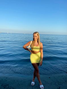 Yellow co ord oh polly, greece, beach, sand, sunset, sea, sky, holiday pics, european summer, boats Holiday Outfit Ideas, Holiday Pics, Summer Boats, Greece Beach, Sunset Sea, Holiday Pictures, Holiday Outfit, Oh Polly, Beach Poses