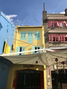 the building is painted yellow and blue