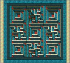 a blue and red quilt with squares in the shape of rectangles on it