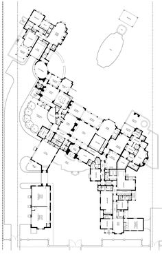 the floor plan for an apartment building with multiple floors and several rooms, all in black and white