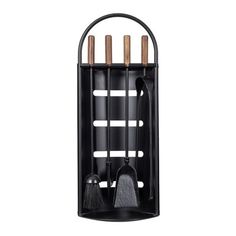 a black metal rack with four brushes and two brooms in the center, on a white background