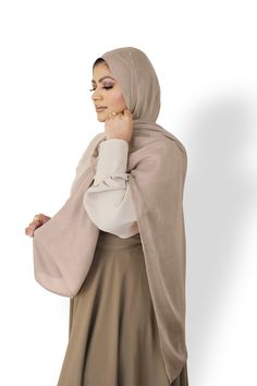 About Modal : This Modal hijab is the ideal material for every hijabi’s collection. We know how stressful it can be to wear a hijab that isn’t comfortable, which is why we’ve chosen this lightweight, easy-to-wrap fabric. The perfect balance of style, comfort, and ease makes our modal an excellent choice for hijab. It’s effortless to wrap - and looks fabulous worn! Features: Easy to wear + style. Our lightest and most durable fabric yet. Material: 100% Rayon Type: Rectangle Hijab. Size: Standard Beige Hijab, Modal Hijab, Hijab Colors, Wrap Fabric, Neutral Beige, Fabric, How To Wear